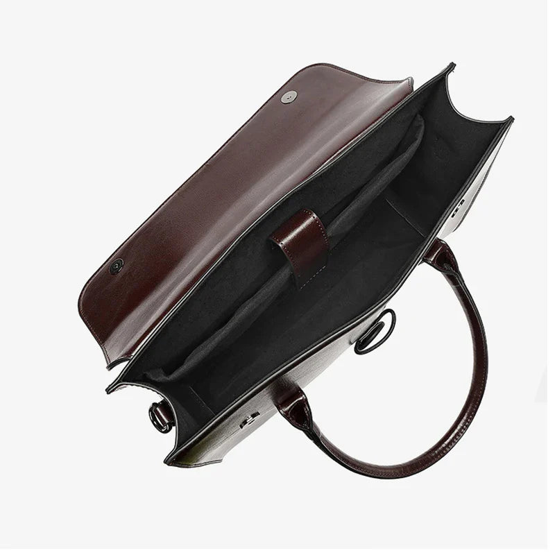 Sac Antonella en cuir souple pour femme, couleur vert sapin, idéal comme sac de travail ou porte-documents.