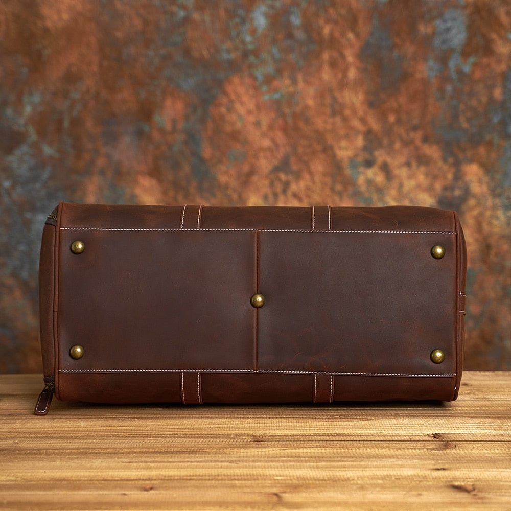 Vue intérieure sac voyage homme cuir, doublure textile, compartiments spacieux, organisation facile