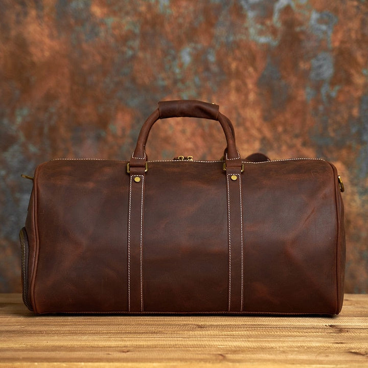Sac week-end homme en cuir véritable, pieds de protection métalliques, stabilité et durabilité