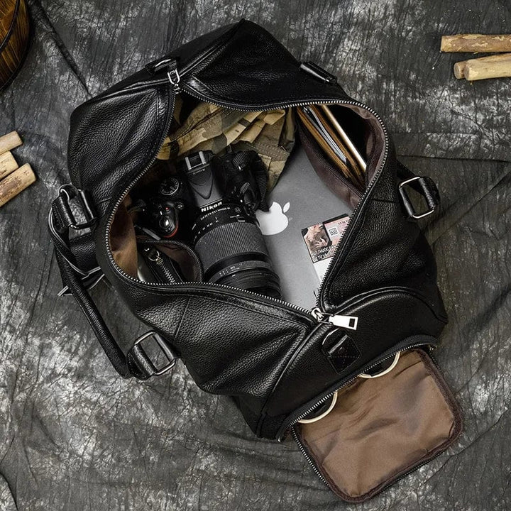 Sac de sport en cuir véritable de grande capacité pour homme, couleur cognac, poignées solides, design voyage et weekend, luxe.