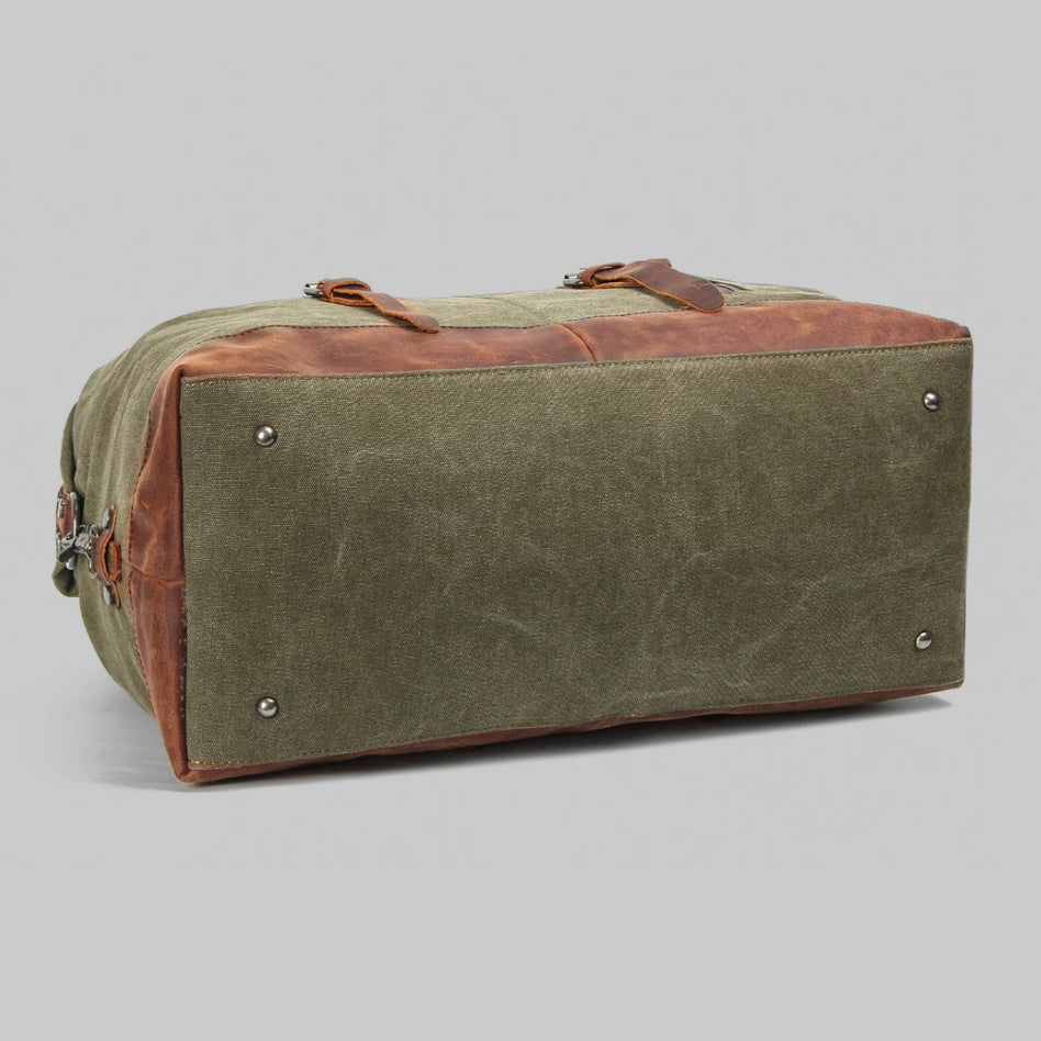 Sac de voyage week-end vintage en toile cirée durable, avec des accents en cuir véritable.