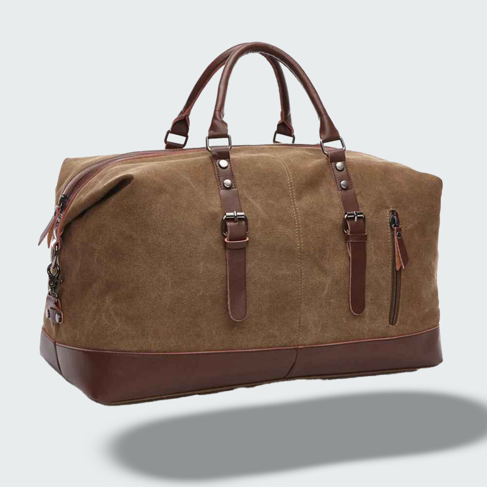 Sac de voyage fourre-tout vintage ouvert, dévoilant son grand espace, en toile cirée.