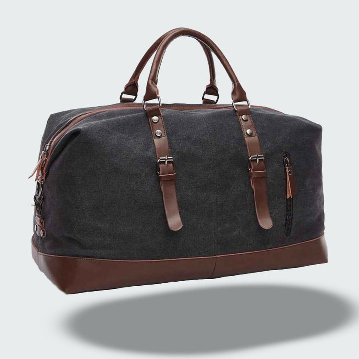 Sac de voyage en toile cirée et cuir pour week-end, avec un look vintage intemporel et résistant.