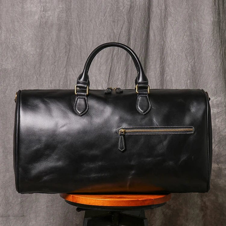 Sac de voyage homme noir en cuir véritable, parfait pour le weekend, style moderne