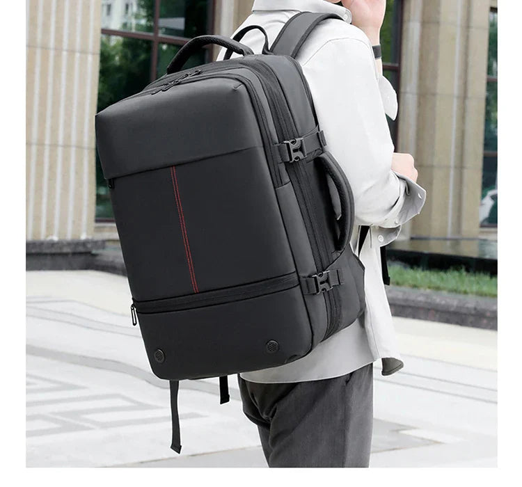 Sac à dos de voyage homme grand format avec multiples compartiments, idéal pour cabine, compression intégrée