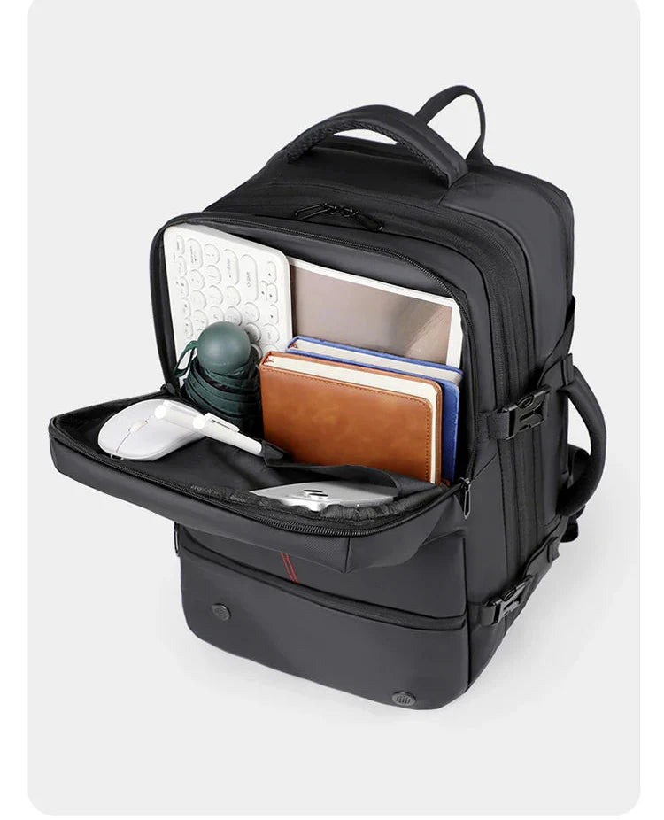 Sac à dos cabine pour homme ouvert, montrant l'intérieur spacieux et les poches organisées pour accessoires