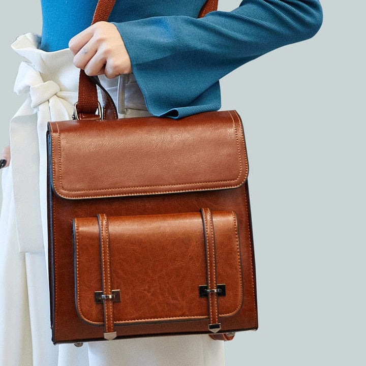 Sac à dos en cuir femme avec dragonne supérieure renforcée, confortable à tenir, sac de qualité