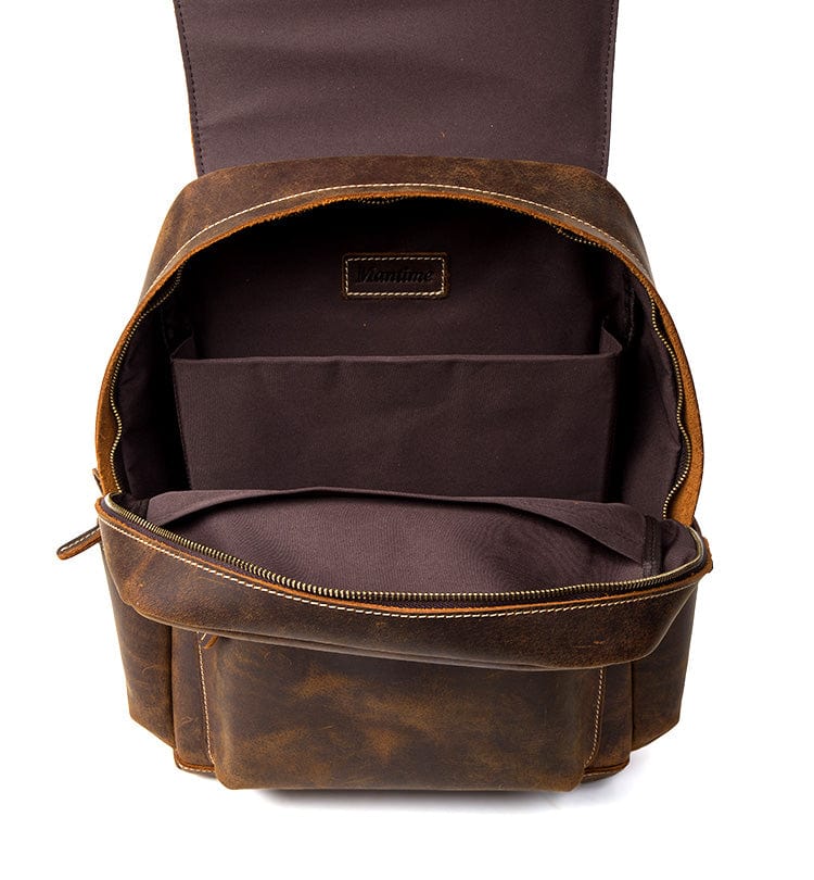 Sac à dos en cuir pratique et chic pour homme, idéal pour le travail ou le voyage.