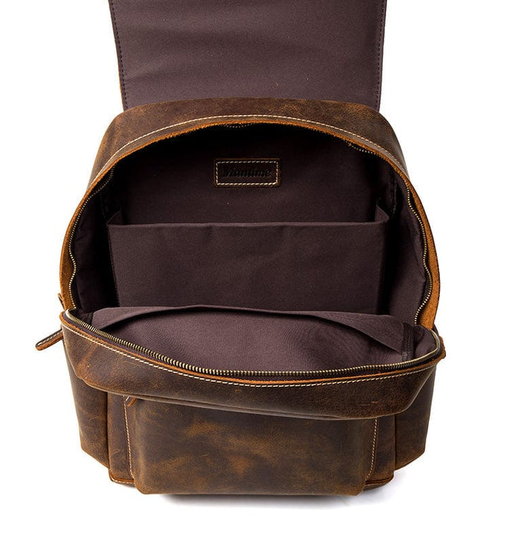 Sac à dos en cuir pratique et chic pour homme, idéal pour le travail ou le voyage.