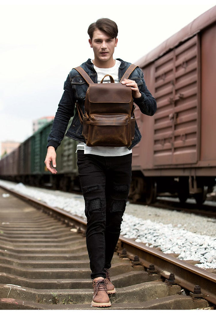 Sac à dos homme en cuir de haute qualité, couleur café, résistant à l'usure.
