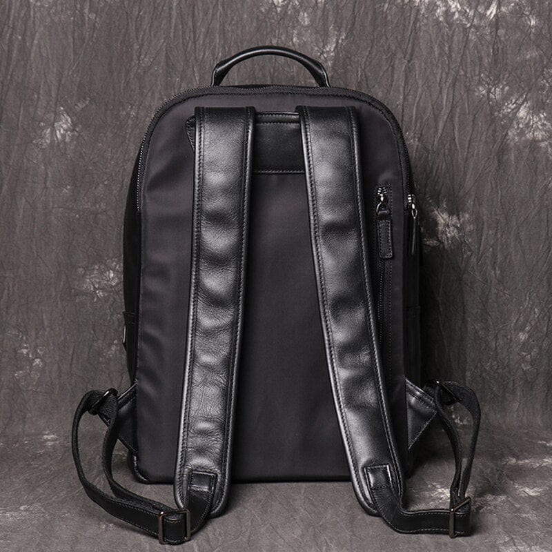 Sac à dos homme en cuir véritable, fonctionnel pour ordinateur portable et voyage d'affaires.
