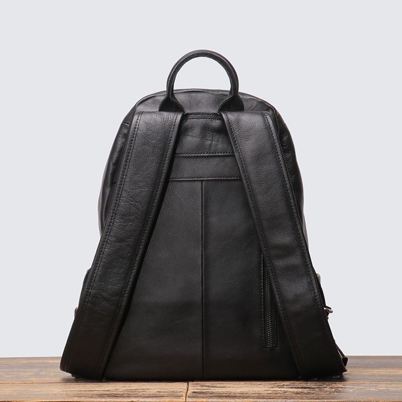 Sacoche à dos raffinée en cuir véritable noir, parfaite pour l'homme moderne et organisée