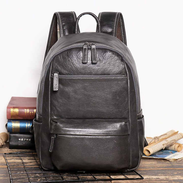 Sac à dos élégant en cuir véritable noir, adapté pour homme, avec des bretelles ajustables confortables
