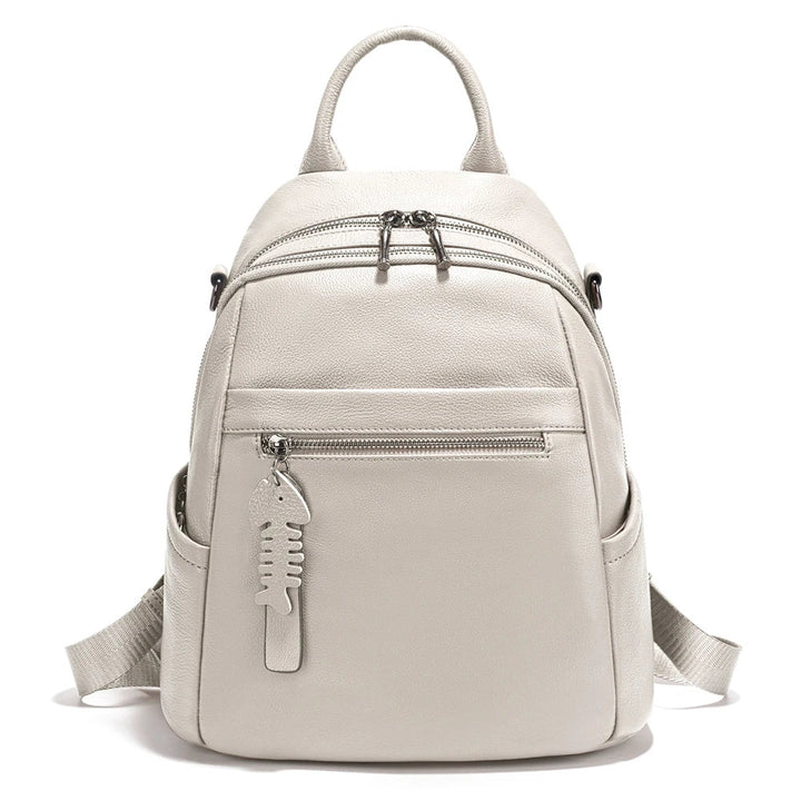 Sac à dos polyvalent en cuir pour femme, idéal pour le bureau, le shopping ou une escapade rapide.