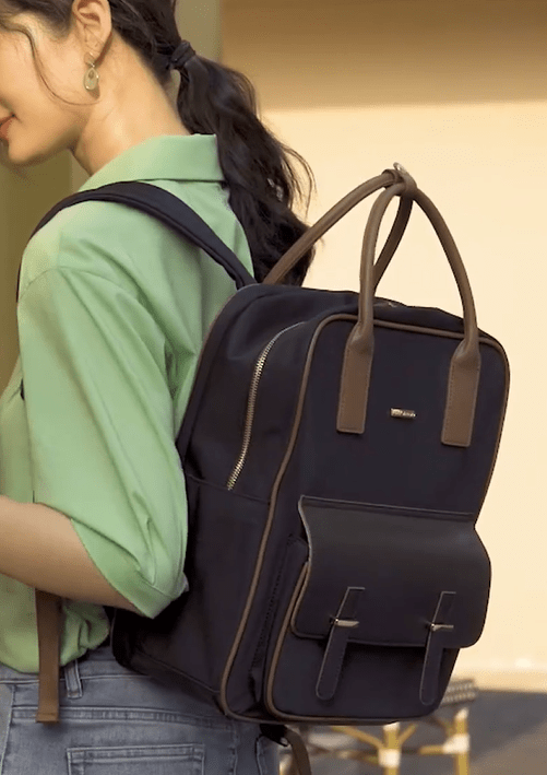 Sac à dos femme noir en cuir PU, design chic, compatible PC 15 pouces, parfait pour le quotidien.