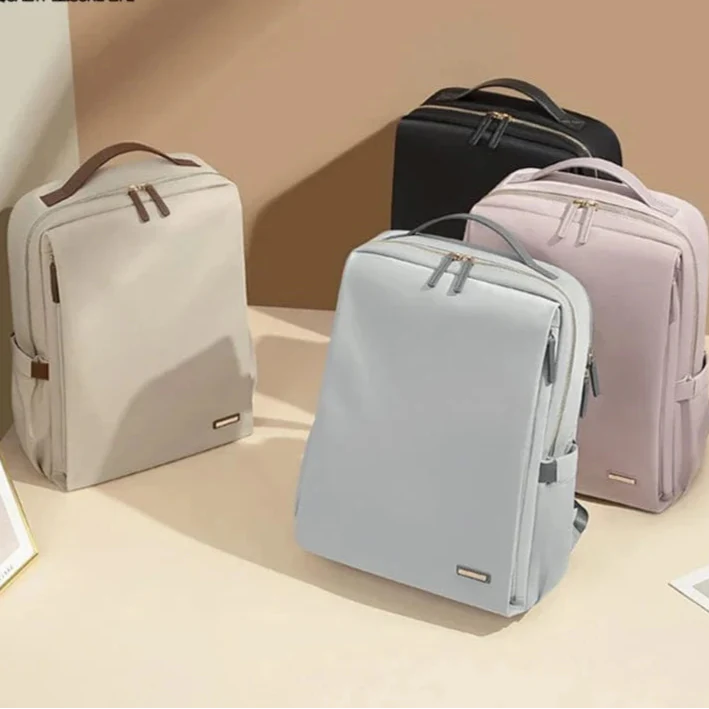 Sac à dos femme polyvalent en nylon imperméable, idéal pour le travail, le voyage et les loisirs.