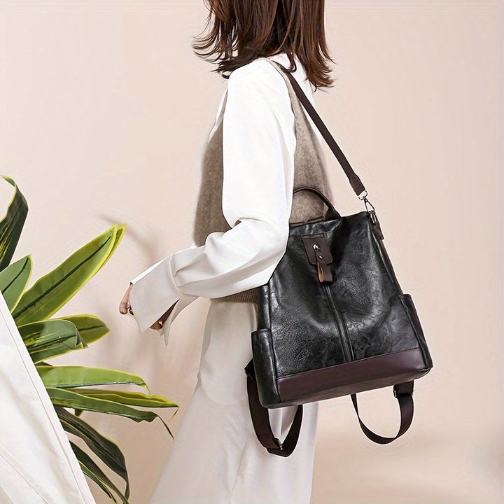 Sac à dos sécurisé en cuir végétalien, style chic, sac de voyage ou quotidien pour femme.
