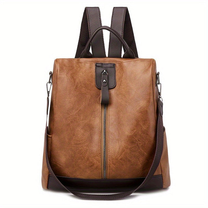Sac à dos de voyage antivol pour femme, en cuir végétalien, spacieux et sécurisé.