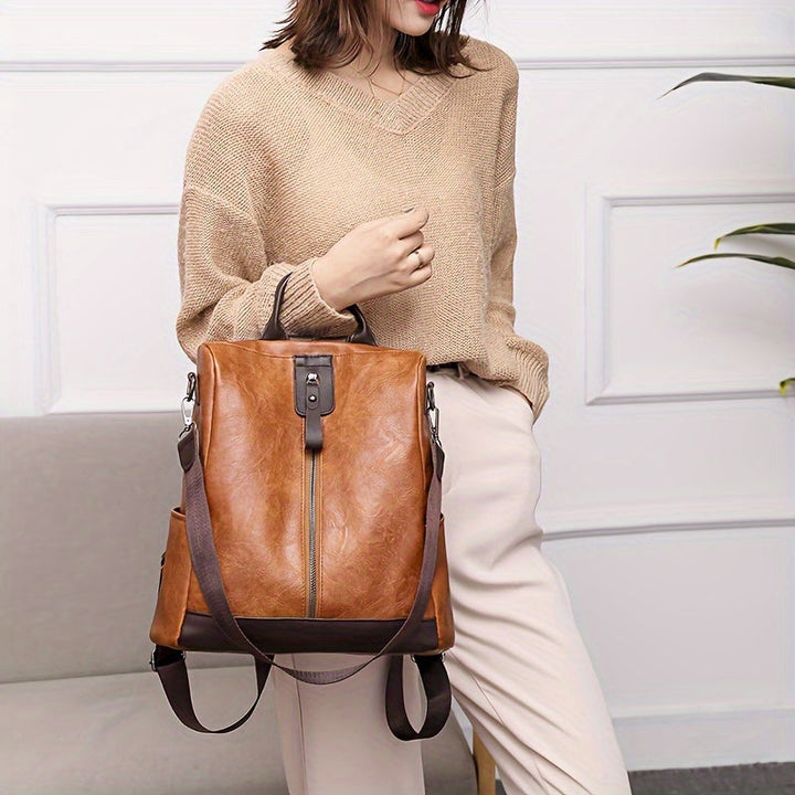 Sac à dos féminin en cuir PU, style moderne et protection antivol, pour toutes occasions.