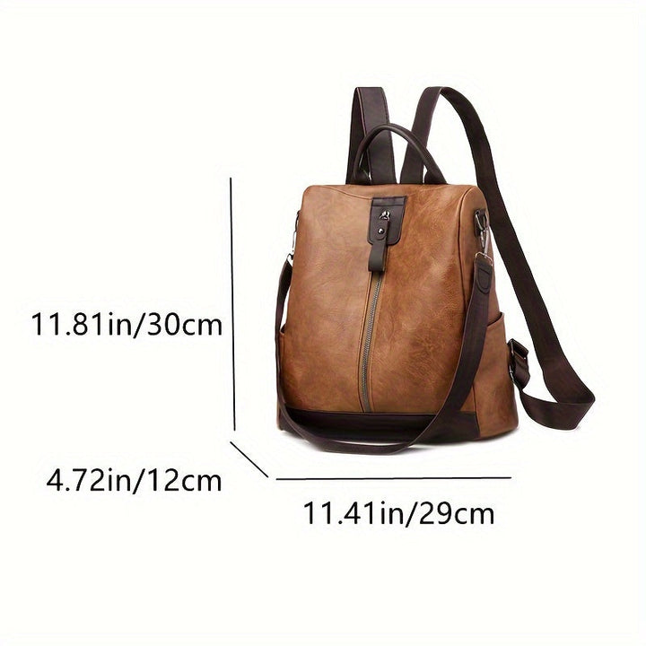 Sac à dos antivol pour femmes, cuir PU végétalien noir, allie élégance et fonctionnalité.