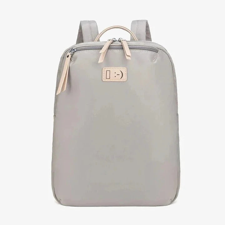 Sac à dos chic pour femme avec espace rembourré pour ordinateur portable 14 pouces, parfait pour le bureau.