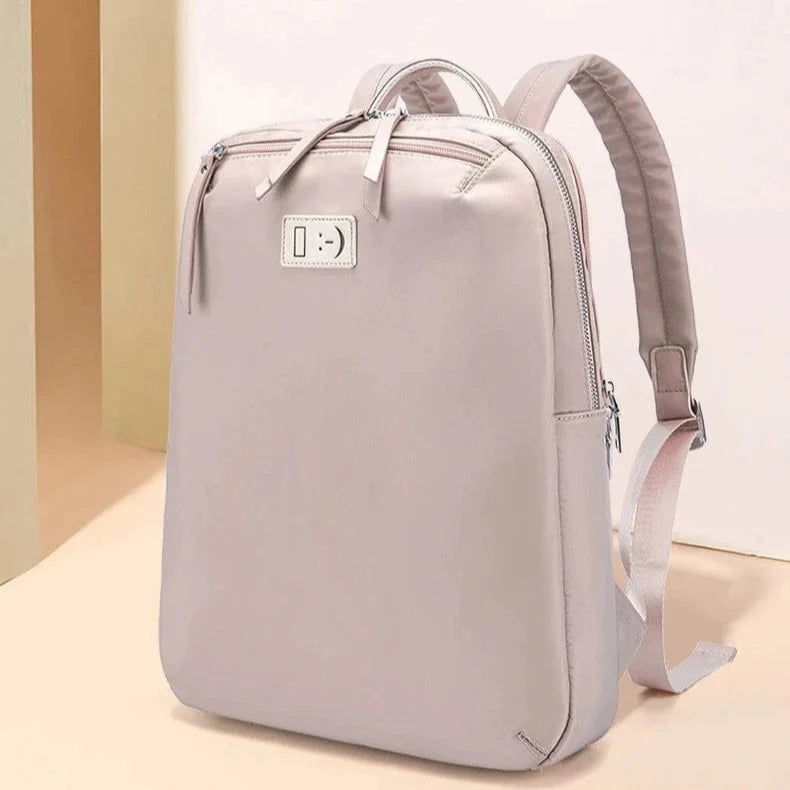 Sac à dos femme résistant à l'eau, grande capacité, adapté aux ordinateurs 14 pouces, couleur unie.