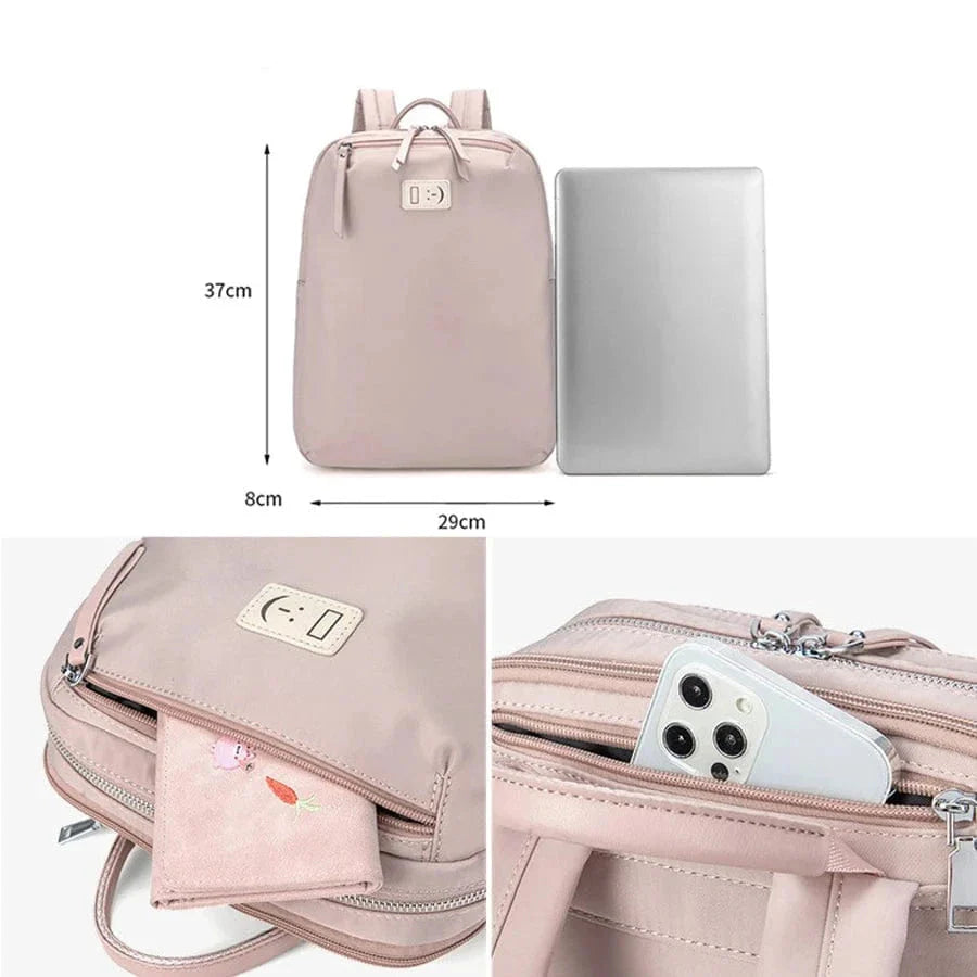 Sac à dos femme noir, design raffiné, poches multiples, capable de transporter un PC 14 pouces en sécurité.