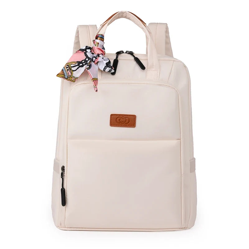 Sac à dos femme moderne et chic, parfait pour transporter ordinateur portable 13 pouces au quotidien avec style.