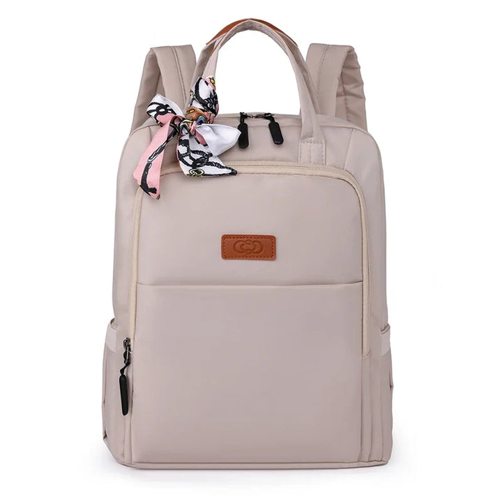 Sac à dos femme léger et confortable en nylon pour ordinateur portable 13 pouces, accessoire élégant et pratique.