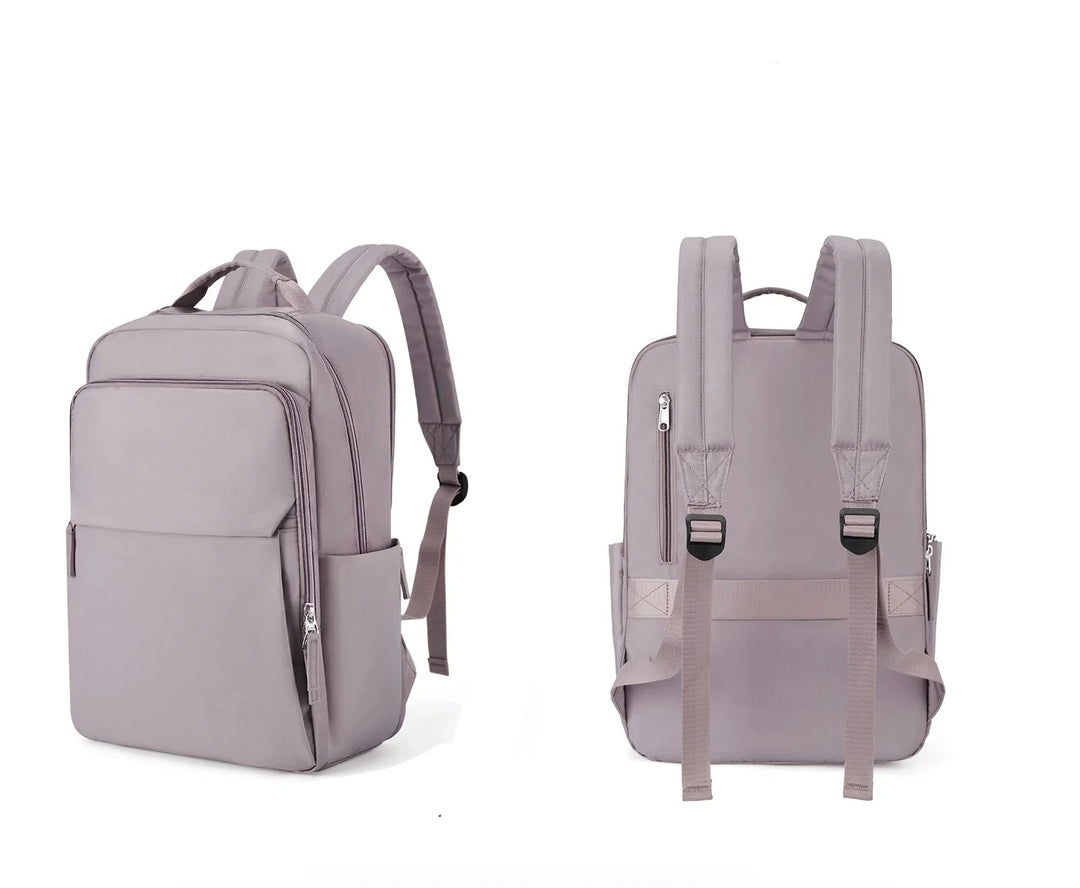 Accessoire femme : sac à dos moderne noir, conçu pour ordinateur portable et usage quotidien