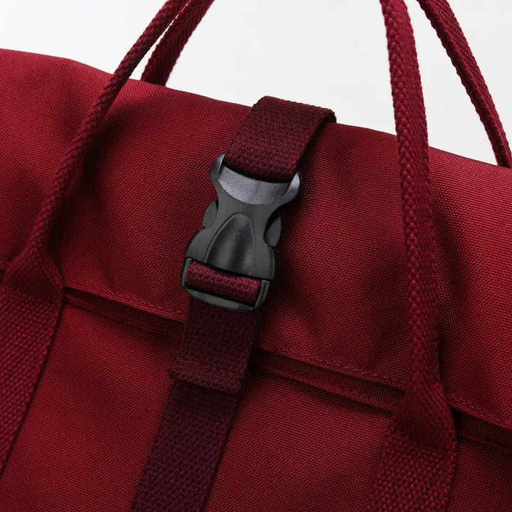 Intérieur spacieux du sac à dos femme en toile claire, idéal pour l'ordinateur portable.