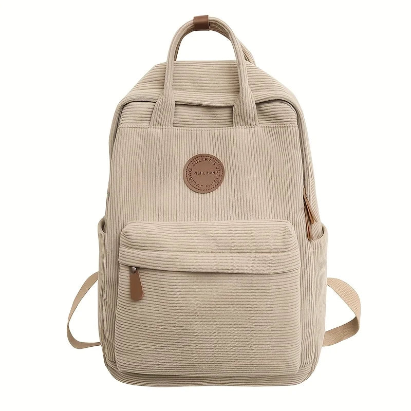 Sac à dos femme en velours côtelé, parfait pour le transport d'ordinateur, style chic et urbain.