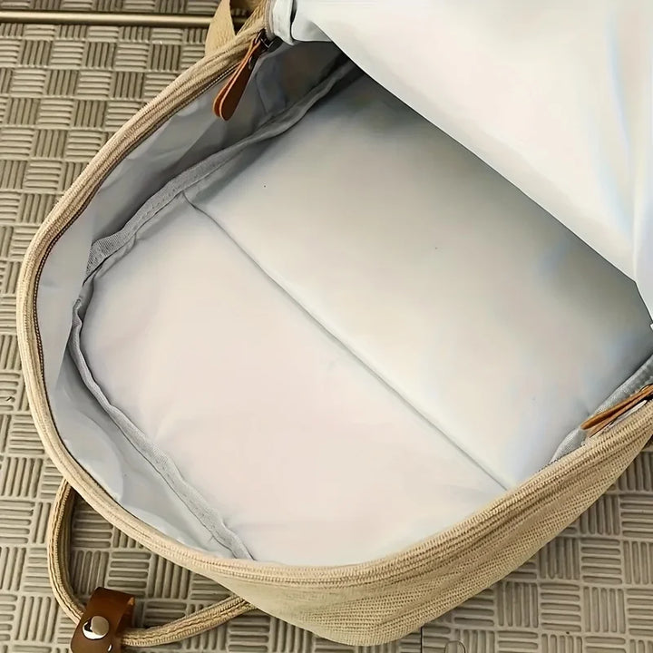 Sac à dos femme tendance en velours côtelé, couleur unie, pour un look mode et pratique.