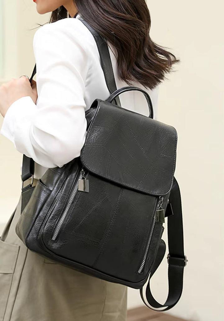 Sac de voyage femme antivol noir, avec compartiments cachés, assure la sécurité de vos affaires.
