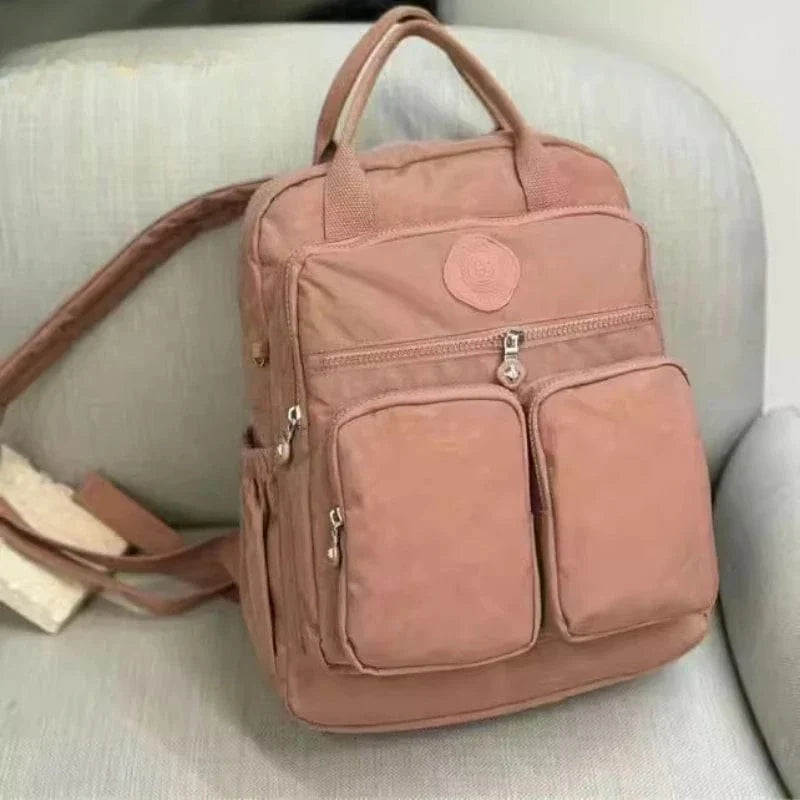 Sac à dos femme grande ouverture pour faciliter le rangement au collège, à l'école ou de l'ordinateur 14 pouces.