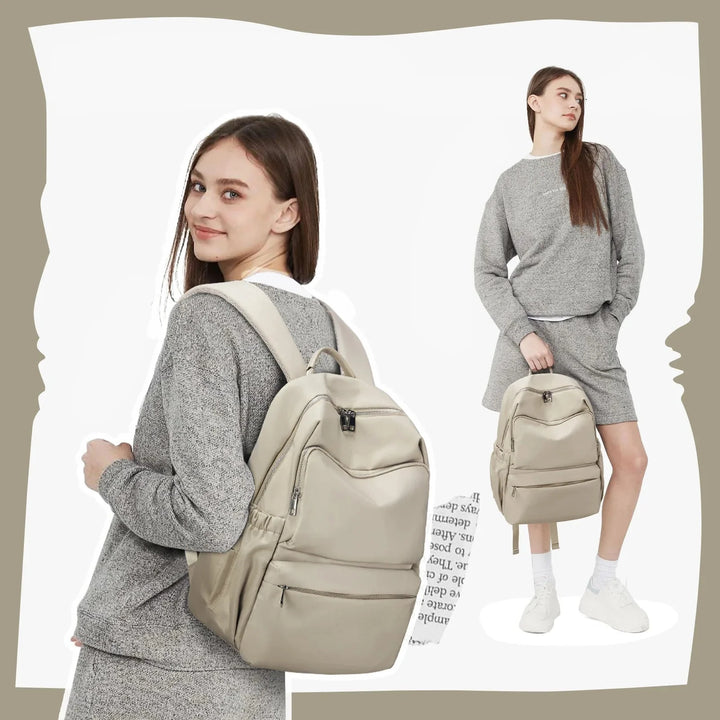 Sac à dos femme élégant noir, en nylon imperméable. Compartiment pour PC. Parfait travail et école.