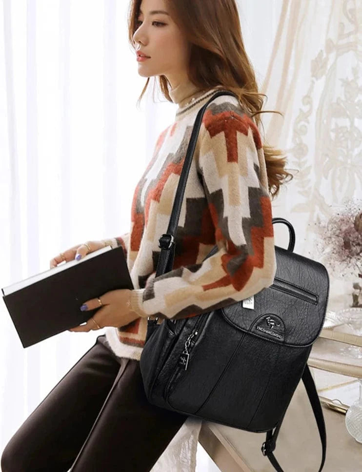 Sac à dos Silvy, couleur bleu marine, en cuir PU résistant, accessoire élégant pour toute occasion.