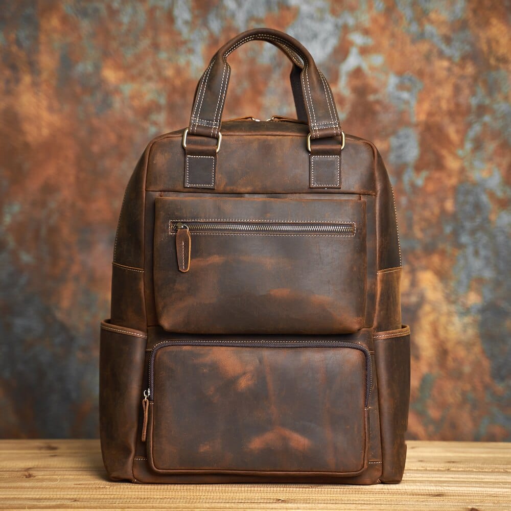 Sac à dos homme en cuir véritable couleur café avec compartiment ordinateur, élégant et pratique