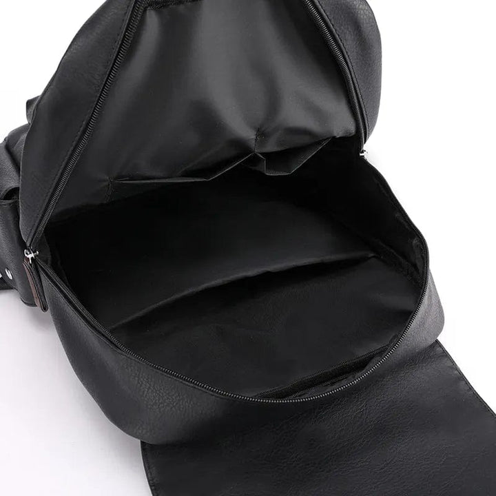 Sac à dos noir en cuir PU, idéal pour homme, offrant un espace de rangement généreux et un design moderne