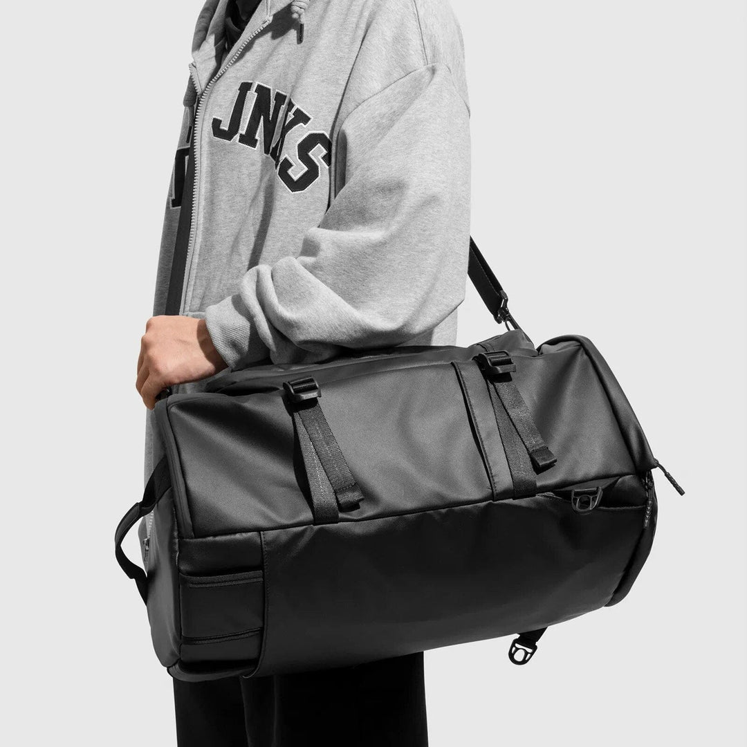 Sac à dos homme multipoches en cuir PU noir, pratique pour organiser ses affaires personnelles et professionnelles.