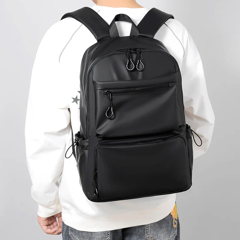 Sac à dos professionnel homme étanche, style moderne, adapté pour transporter un ordinateur