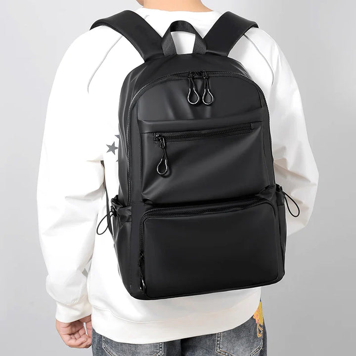 Sac à dos professionnel homme étanche, style moderne, adapté pour transporter un ordinateur