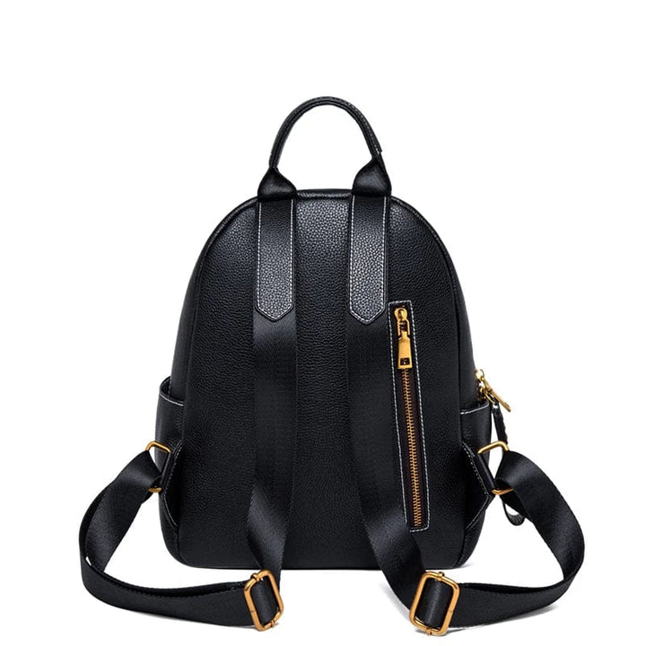 Intérieur spacieux d'un sac à dos femme en cuir véritable vert, parfait pour organiser les essentiels du quotidien.