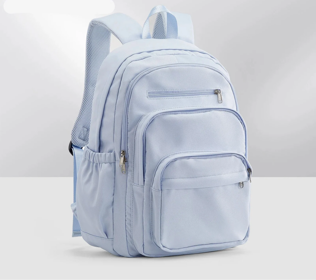 Sac à dos scolaire unisexe avec multiples compartiments pour livres et ordinateur, idéal pour l'organisation du lycée.