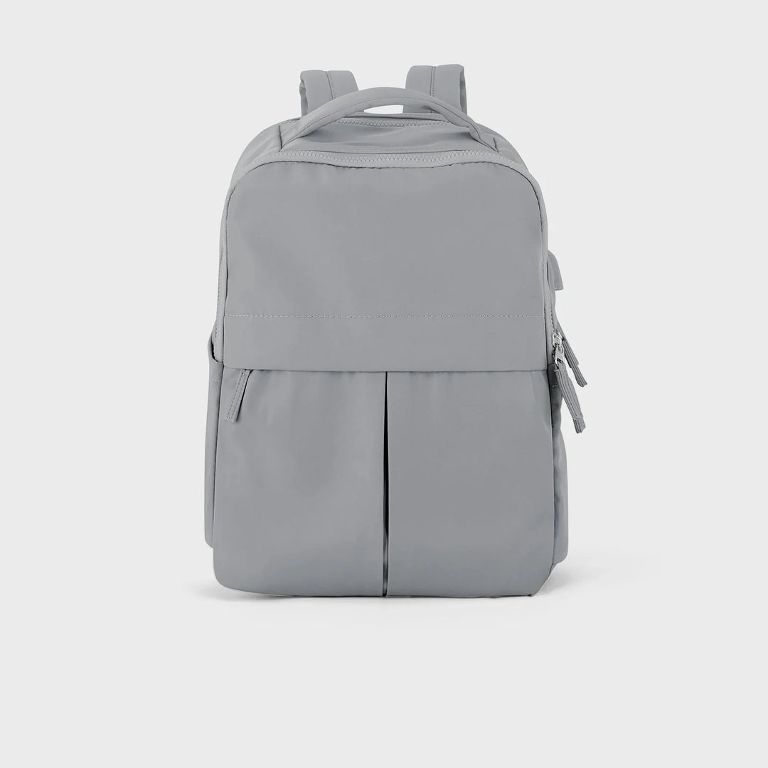 Sac à dos ordinateur femme au design épuré et moderne, chic pour le bureau, l'école ou les voyages.