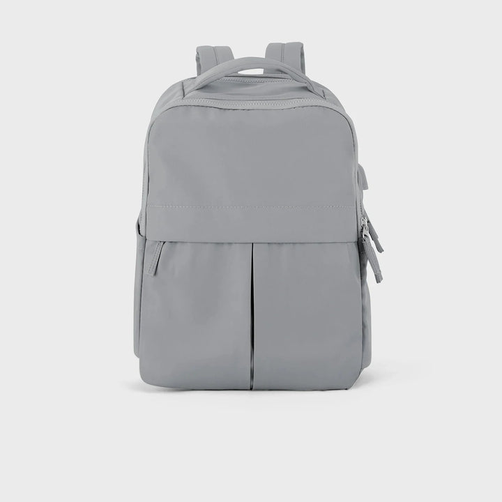 Sac à dos ordinateur femme au design épuré et moderne, chic pour le bureau, l'école ou les voyages.