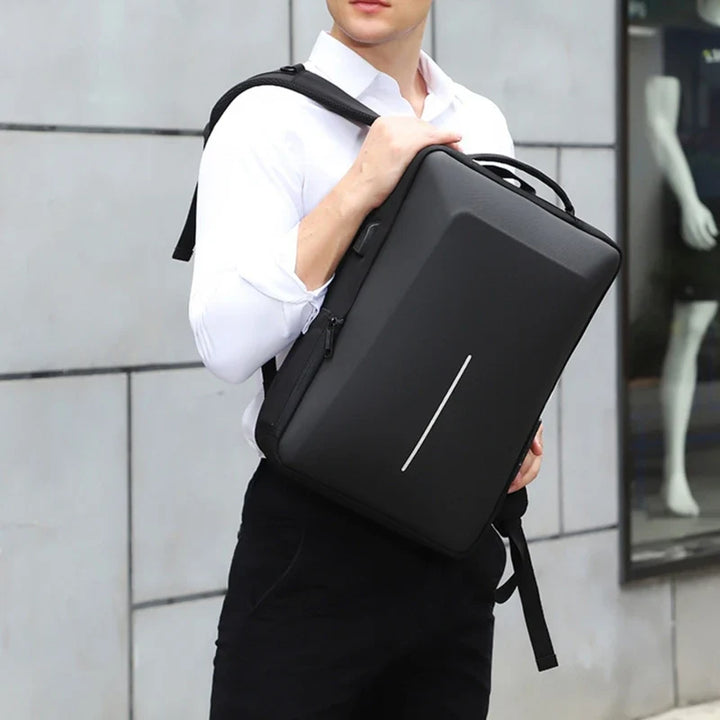 Sac à dos rigide homme anti-vol pour PC portable, parfait pour la sécurité de vos équipements en déplacement.
