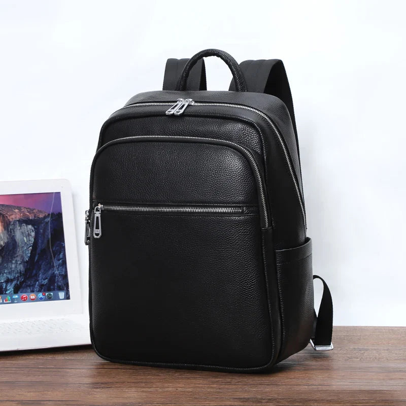 Sac à dos professionnel en cuir véritable noir, moderne et fonctionnel, pour transporter votre ordinateur