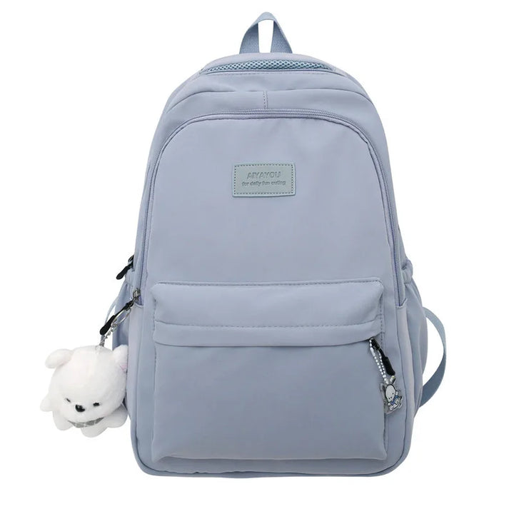 Grand sac à dos scolaire, capacité maximisée, compartiments pour organisation facile.