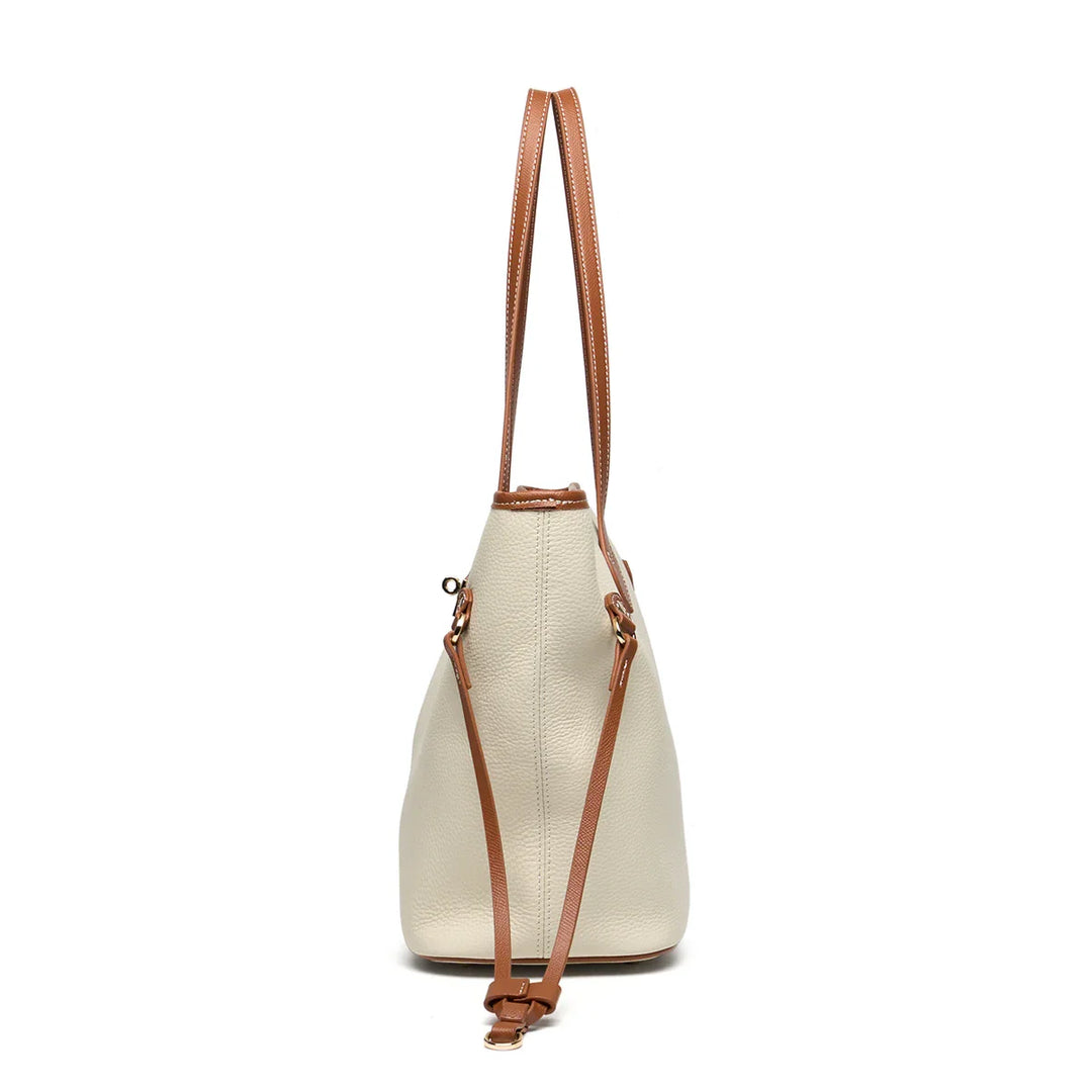 Fermeture éclair solide du sac fourre-tout Amalfi, sécurisant vos effets personnels avec style.